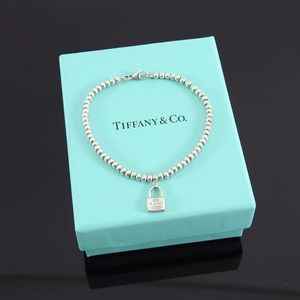 Tiffany and Co. Bead Bracelet with Lock Charm